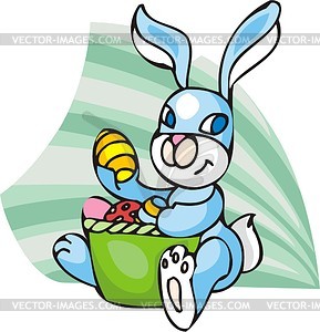 Easter rabbit and painted Easter eggs - vector clipart