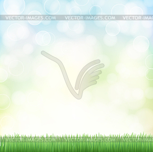 Spring background with green grass and bokeh effect - vector clip art