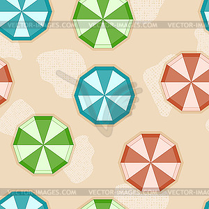 Seamless background with sun umbrellas on sandy beach - vector clipart