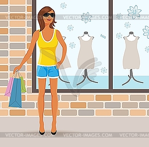 Modern girl with shopping bags - vector clipart