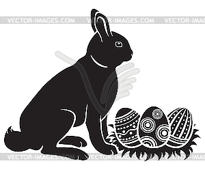 Easter bunny and eggs - vector clipart