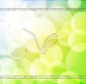 Green spring background with blurry light - vector image
