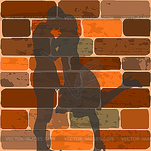 The shadow of teenagers kissing on bric - vector image