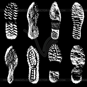 Collection imprint soles shoes black silhouette - vector clipart / vector image