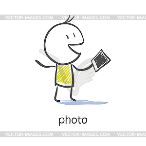 Man holds photo - vector clipart