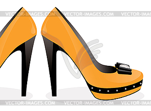 Pair of yellow shoes - vector image