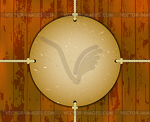 Round cardboard frame on ropes - vector image