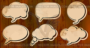 Aged cut out speech bubbles - stock vector clipart