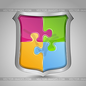 Shield with puzzle pieces - vector clip art