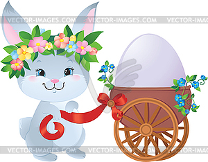 Easter Bunny with egg in small cart - vector clip art