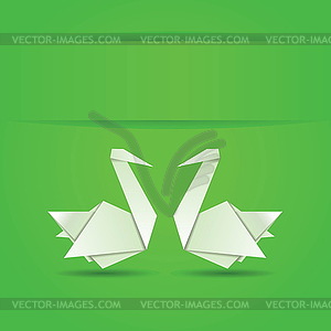 Оригами лебеди на зеленом фоне - графика в векторе