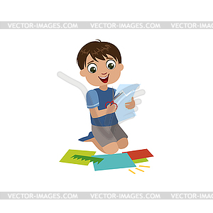 Boy Cutting Application Details - vector clipart