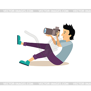 Sitting Photographer in Flat Style - vector clip art