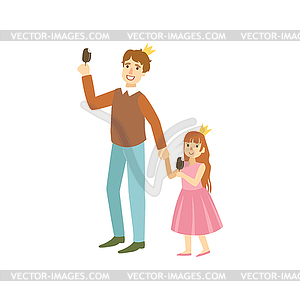 Father And Daughter Wearing Crowns Eating Ice-Cream - vector image