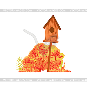 Bird House And Bush With Orange Leaves As Autumn - vector clipart