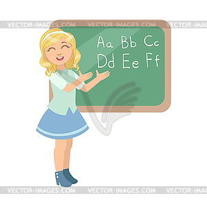 Girl In School Uniform Standing Next To Blackboard - vector clipart