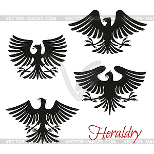 Heraldic black eagle, falcon or hawk bird symbol - vector image