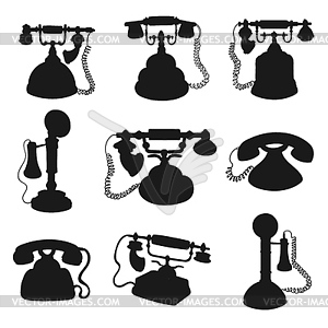 Retro phone, rotary dial telephone silhouettes - white & black vector clipart