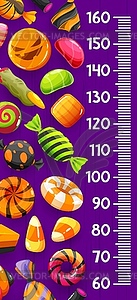 Kids height chart with cartoon Halloween candies - vector image