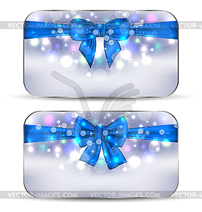 Christmas glowing cards with gift bows - vector clipart