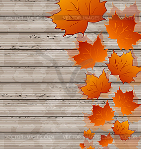 Autumn leaves maple on wooden texture - vector clip art