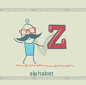 Man standing with letter of alphabet - vector clip art