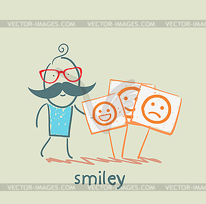 Man stands next to posters with smiles - vector clipart