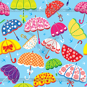 Seamless pattern with colorful umbrellas on blue - vector image