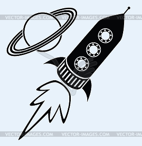 Ракетный корабль и планета Сатурн символов - векторный клипарт Royalty-Free