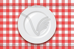 Red picnic tablecloth and empty plate - vector clipart