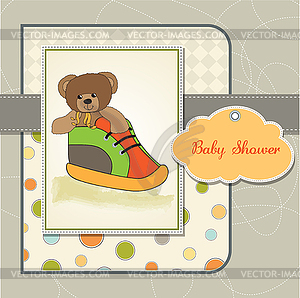 Baby shower card with teddy bear hidden in shoe - vector image