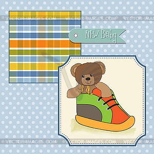 Baby shower card with teddy bear hidden in shoe - vector clipart