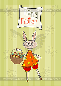 Easter bunny with basket of Easter eggs - vector clipart