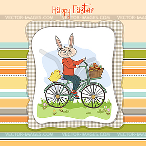 Easter bunny with basket of Easter eggs - vector image