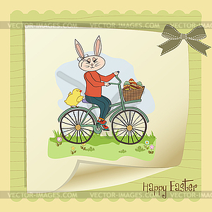 Easter bunny with basket of Easter eggs - vector image