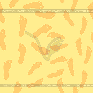 Male and female footprints in sand - vector clipart