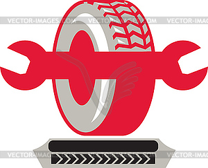 Tire With Spanner Wrench Retro - vector clipart