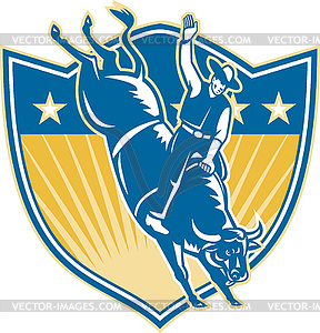 Rodeo Cowboy Riding Bucking Bull Stars Shield Retro - vector image