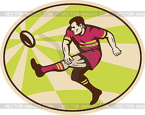 Rugby player kicking ball - stock vector clipart