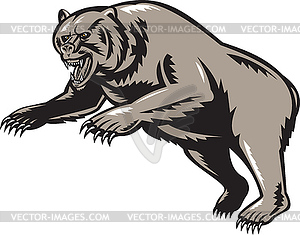 Grizzly bear attacking woodcut style - vector image