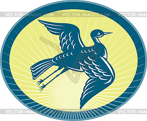 Heron flying up side view with sunburst - vector clipart
