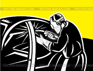 Welder with welding torch working on car - vector clip art