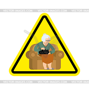 Attention grandmother. Caution old woman and cat. - vector image