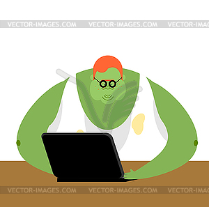 Internet trol. Big green monster and laptop - vector clip art