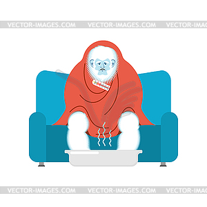 Yeti sick sitting in armchair wrapped in blanket. - vector clip art