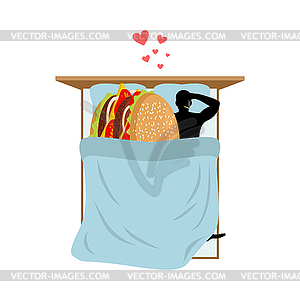 Lover fast food. Man and hamburger in bed. Guy and - vector clipart