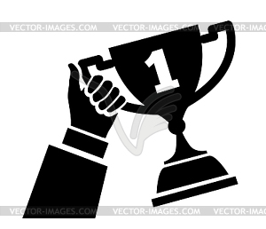 Hand holding trophy - vector image