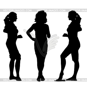 Black silhouettes of beautiful womans. Vecto - vector clip art