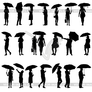 Set of black silhouettes of men and women with - vector EPS clipart