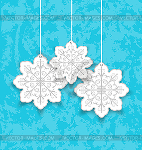 Set Christmas paper snowflakes on blue grunge - vector clipart